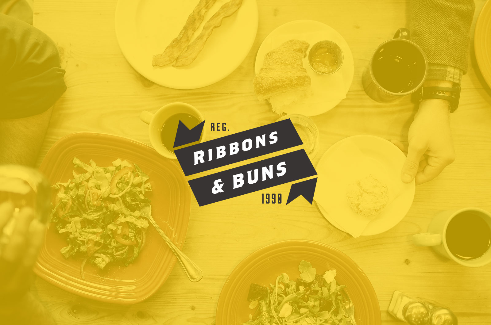 Ribbons & Buns logo on dining table.